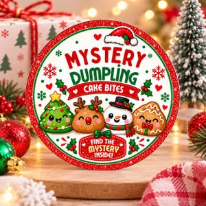 May include: A circular sign with a red glitter border featuring the text MYSTERY DUMPLING CAKE BITES and FIND THE MYSTERY INSIDE. The design includes illustrations of a Christmas tree, a reindeer, a snowman, and a gingerbread cookie.