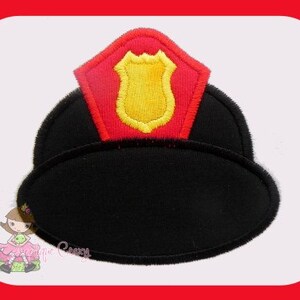 May include: Black felt firefighter hat applique with a red and yellow embroidered badge.