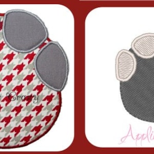 Könnte beinhalten: Zwei gestickte Pfotenabdrücke. Einer zeigt ein rot-weiß-graues Hahnentrittmuster mit grauen Pfotenballen. Der andere ist ein einfarbiger grauer Pfotenabdruck mit hellbraunen Pfotenballen. Der Text "Applique Crazy" ist sichtbar.
