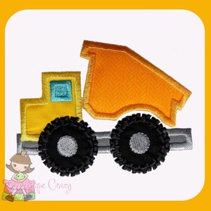 Ontwerp in appliqué met dumptruck