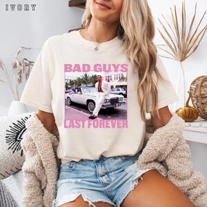 May include: A set of three ceramic mugs with a speckled, matte finish. The mugs are in shades of cream, light gray, and dark gray. Each mug has a simple, modern design and a rounded handle. The mugs are stacked on top of each other.