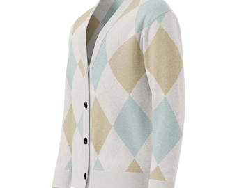 May include: A long-sleeve V-neck cardigan featuring a light gray base with an argyle pattern in muted tan and pale blue. The garment includes a button-down front closure with four dark buttons, ribbed cuffs, and a ribbed hem along the bottom edge.