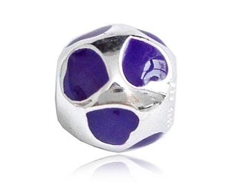 May include: A spherical silver charm bead featuring a polished metallic finish with inlaid deep purple enamel heart-shaped accents distributed across the surface. The bead has a central hole for threading onto a bracelet or necklace chain.