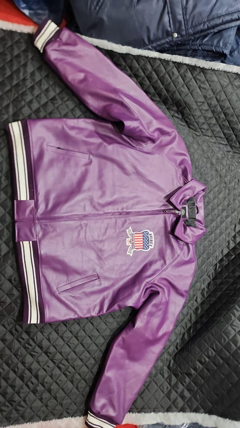 May include: A rustic wooden sign with the text "Welcome to our home" in white lettering. The sign features a distressed finish and a simple, inviting design, perfect for a front porch or entryway.