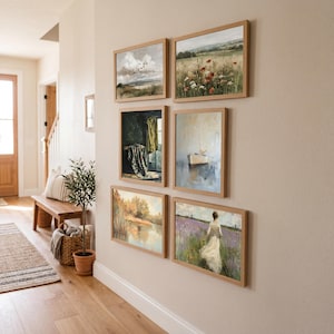A six-piece French country printable art arrangement showing soft vintage landscapes and figure scenes. The artworks include birds flying over a marsh, a poppy meadow landscape, a dark interior with a chair near a window, a minimalist boat on still water, a warm reflective river scene, and a woman walking through a lavender field. The palette blends beige, dusty blue, brown, sage, and muted terracotta for a grounded countryside gallery wall feel.