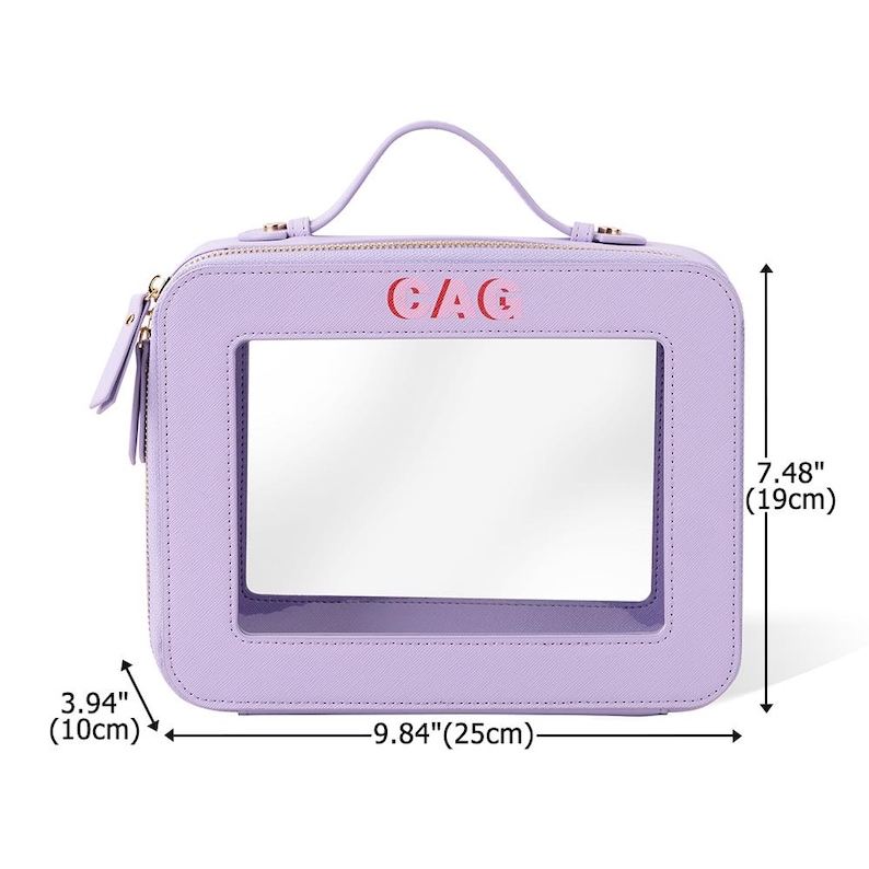May include: A lavender cosmetic bag with a clear window and a top handle. The bag is rectangular, measuring 9.84 inches (25cm) wide, 3.94 inches (10cm) deep, and 7.48 inches (19cm) tall. The text "CAC" is printed in red on the front.