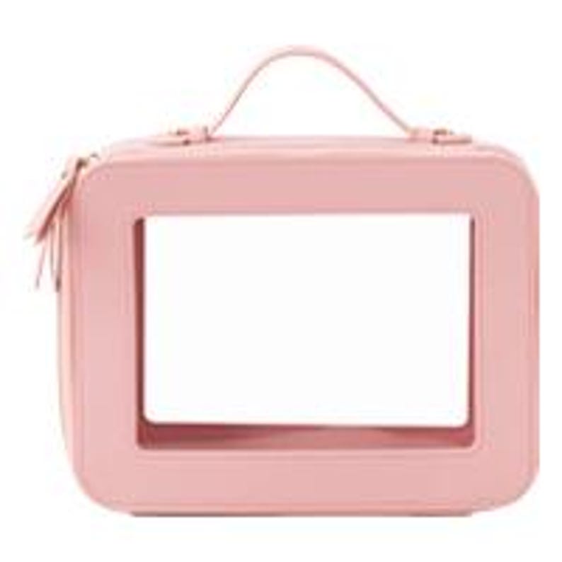 May include: A light pink rectangular makeup bag with a handle and a clear window. The bag has a zipper closure and a small tassel. The bag is made of a smooth material.