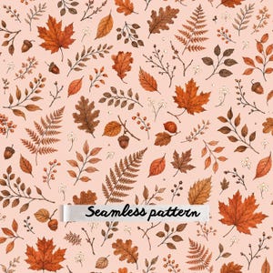 May include: A seamless pattern featuring a variety of hand-drawn botanical elements including maple leaves, oak leaves, ferns, acorns, and small berries in shades of brown and orange, set against a light peach background with the text Seamless pattern.