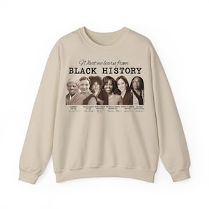 May include: A beige sweatshirt with the text "What we learn from BLACK HISTORY" above a row of six women's portraits. Each portrait has a name and a short phrase below it, including Harriet Tubman, Rosa Parks, and Michelle Obama.