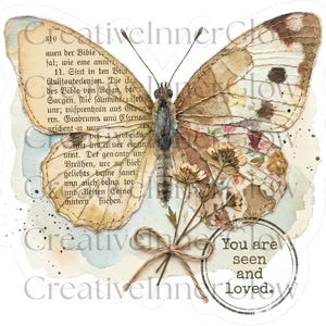 May include: A butterfly illustration featuring wings collaged with vintage German book pages, floral patterns, and brown ink splatters. A small bundle of dried flowers tied with twine sits below, alongside a circular stamp reading You are seen and loved.