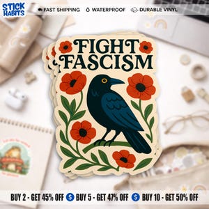 May include: A die-cut sticker with a cream background featuring a black crow perched on a green branch, surrounded by red poppy flowers. The text FIGHT FASCISM is printed in bold black capital letters at the top of the sticker design.