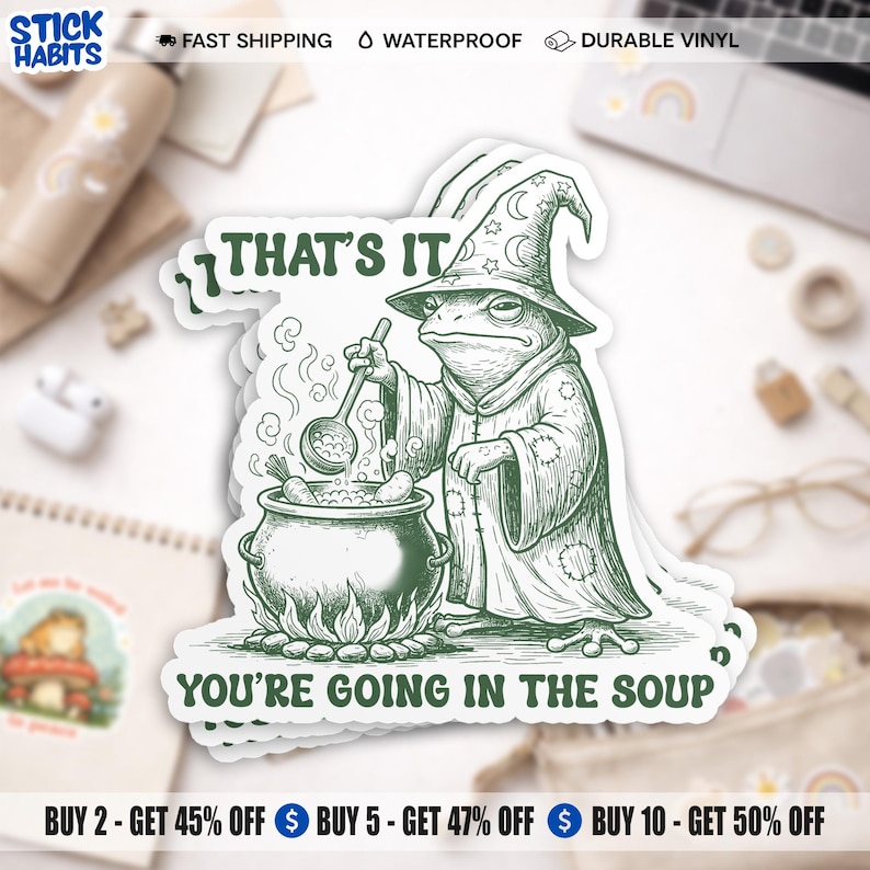 May include: Green and white sticker featuring a frog wizard stirring a cauldron. The sticker has the text "THAT'S IT" and "YOU'RE GOING IN THE SOUP". The sticker is waterproof and made of durable vinyl.