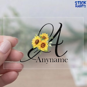 May include: A set of three ceramic mugs with a speckled, matte finish. The mugs are in shades of cream, light gray, and dark gray. Each mug has a simple, minimalist design and a rounded handle.