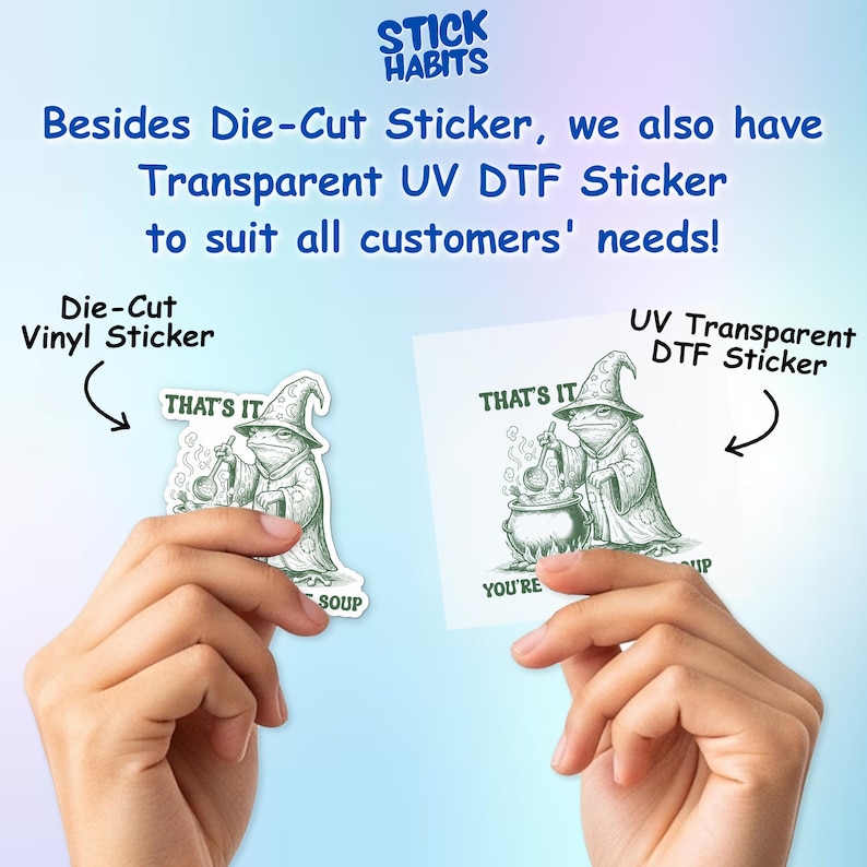 May include: Two stickers are shown, one die-cut vinyl and one UV transparent DTF. Both feature a cartoon frog in a wizard hat stirring a cauldron. The text "THAT'S IT" is above the frog, and "SOUP" and "YOU'RE" are below.