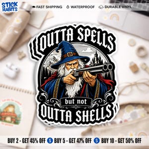 May include: A die-cut vinyl sticker featuring a wizard with a long white beard and blue hat holding a double-barreled shotgun. The text reads OUTTA SPELLS at the top and but not OUTTA SHELLS at the bottom, set against a background of mountains and a castle.