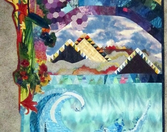 May include: A colorful quilt with a rainbow arch, mountains, and a wave crashing on a beach. The quilt is made of various fabrics and textures, including patchwork, quilted, and applique.