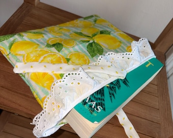 Lemon with white lace trim book cover