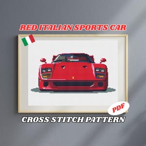 May include: A framed cross-stitch pattern featuring a red Italian sports car. The image is a pixelated design of the car, with the text "RED ITALIAN SPORTS CAR" above and "CROSS STITCH PATTERN" below. A small Italian flag is in the upper left corner.