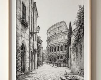 May include: A black and white framed art print depicting a cobblestone street leading toward the Colosseum in Rome. The scene features weathered stone buildings, a wall-mounted lantern, climbing vines, and a small round table with a meal.