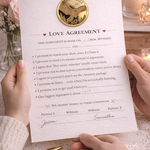 May include: A "Love Agreement" document with a gold coin featuring an eagle. The document includes promises and spaces for signatures. The names "Jason" and "Samantha" are signed at the bottom.