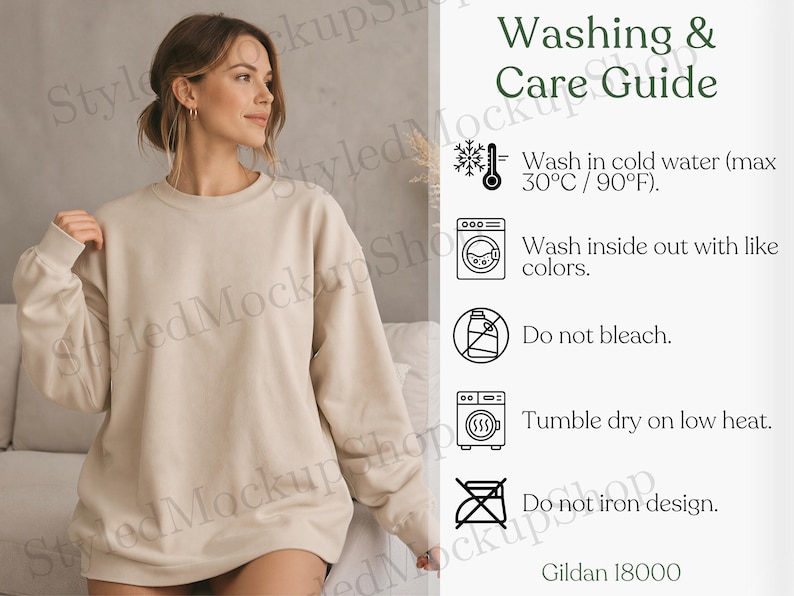May include: A beige crewneck sweatshirt with long sleeves and ribbed cuffs. Next to the sweatshirt is a Washing & Care Guide with icons and text: Wash in cold water (max 90&deg;F), wash inside out, do not bleach, tumble dry low, do not iron design. Gildan 18000.