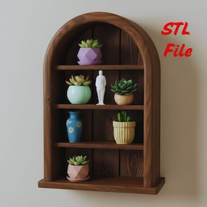 May include: A wooden arched shelf unit with multiple shelves, displaying various potted succulents and a small white figurine. The shelf is stained a dark brown color. The text "STL File" is visible in red. The succulents are in various colored pots.