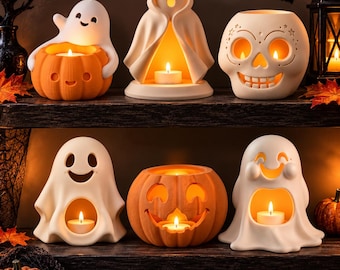 May include: A collection of six ceramic candle holders featuring white ghosts, orange pumpkins, and a white skull. Each piece is illuminated from within by a small tea light candle, casting a warm glow through the cut-out eyes and mouths.