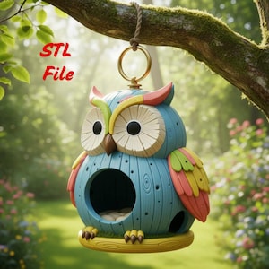 May include: A hanging owl-shaped birdhouse featuring a blue body with wood-grain texture, large cream-coloured circular eyes, and multi-coloured wings in shades of green, yellow, and pink. The text STL File is visible in red on the left side.