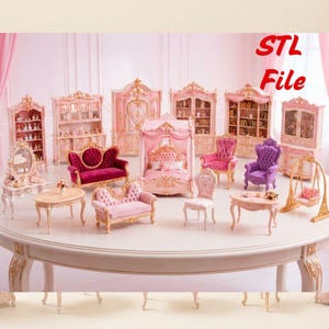 May include: A collection of miniature pink and gold furniture, including a bed, sofas, chairs, and cabinets, arranged on a large, round table. The furniture is ornate with detailed carvings. The text "STL File" is visible in the upper right corner.