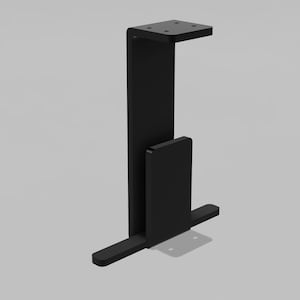 May include: A black, L-shaped bracket with a rectangular base and a smaller, rectangular support piece. The top of the bracket has four holes. The object is designed to hold or support another object.