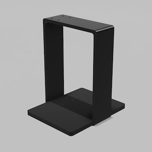 May include: A matte black metal stand featuring a rectangular base and a tall, vertical U-shaped frame. The top horizontal bar of the frame includes four small, evenly spaced circular holes, providing a stable structure for mounting or display purposes.