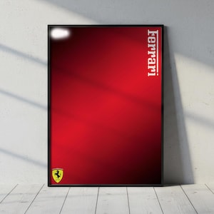 Pode incluir: Um poster emoldurado com um fundo gradiente vermelho vibrante. A palavra "Ferrari" é impressa verticalmente em branco no lado direito. O logotipo da Ferrari está no canto inferior esquerdo. O poster está encostado a uma parede branca.