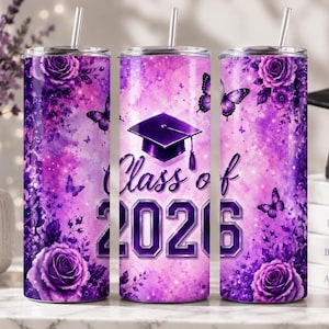 May include: Three purple and white tumblers with a floral and butterfly design. The tumblers have the text "Class of 2021" and a graduation cap graphic. Each tumbler has a silver lid and a straw.
