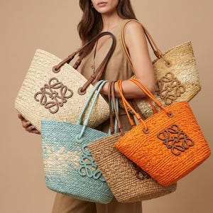 May include: A collection of woven tote bags in various colors, including natural, blue, orange, and tan. Each bag features leather handles and a brown logo. The bags are designed for carrying items.