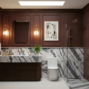 May include: A luxurious bathroom with a dark brown vanity, marble countertop, and a white toilet. The walls are a deep burgundy with a marble accent wall. Gold fixtures and sconces add a touch of elegance. A framed abstract art piece hangs above the toilet.