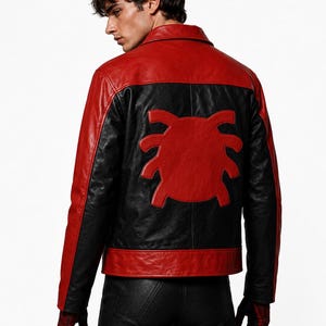 May include: Red and black leather jacket with a large red spider emblem on the back. The jacket has a classic collar and a tailored fit. The sleeves and lower back are black, while the shoulders and upper back are red.