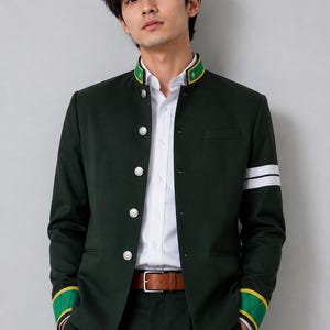 May include: A dark green jacket with a mandarin collar featuring yellow and green trim, silver buttons, and white stripes on the left sleeve. The cuffs are green with yellow and black geometric patterns, worn over a white button-down shirt.