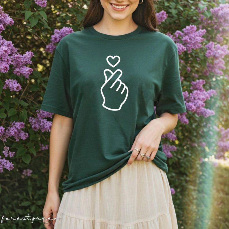 Simple Korean finger heart t-shirt with clean graphic, perfect for minimal fashion and everyday outfits