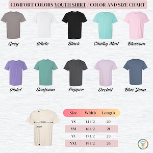 May include: A color and size chart for Comfort Colors youth shirts. The chart displays various shirt colors, including grey, white, black, and violet. The size chart shows measurements for width and length in inches for sizes YS, YM, YL, and YXL.