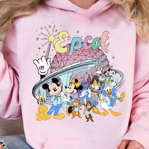 May include: A set of three ceramic mugs with a speckled, matte finish. The mugs are in shades of cream, light brown, and dark brown. Each mug has a simple, minimalist design, perfect for coffee or tea.