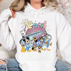 May include: A set of three ceramic mugs with a speckled, matte finish. The mugs are in shades of cream, light gray, and dark gray. Each mug has a simple, minimalist design, perfect for coffee or tea.