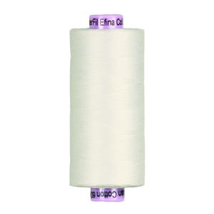 May include: A spool of off-white sewing thread with a cylindrical shape. The top and bottom caps are light purple with black text that reads WonderFil Efina Cotton 60wt. The thread is wound tightly around the central core in a smooth pattern.