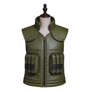 May include: An olive green sleeveless vest featuring a high collar, a central black zipper closure, and two large front pockets. Each pocket is divided into three smaller compartments, each secured with a black plastic buckle and strap.