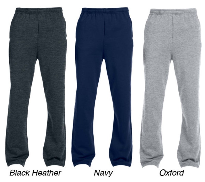May include: Three pairs of sweatpants in different colours: black heather, navy, and oxford grey. The sweatpants have a drawstring waistband and side pockets.
