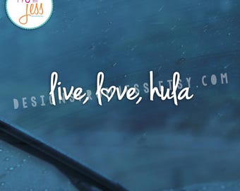 May include: A white vinyl decal with the text "live, love, hula" on a blue background. The decal is on a car window.