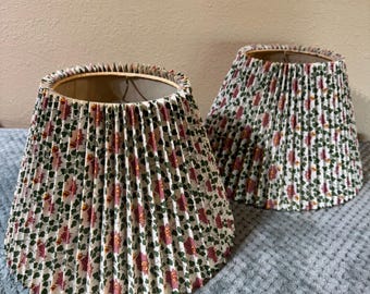 A pair of vintage knife pleated botanical fabric lampshades