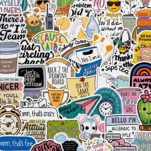 May include: A selection of colourful, die-cut stickers with diverse designs and text. The stickers feature phrases like "I'm sorry I rolled my eyes out loud," and images of a cactus, a mouse with headphones, and a coffee cup. The stickers are on a wooden surface.