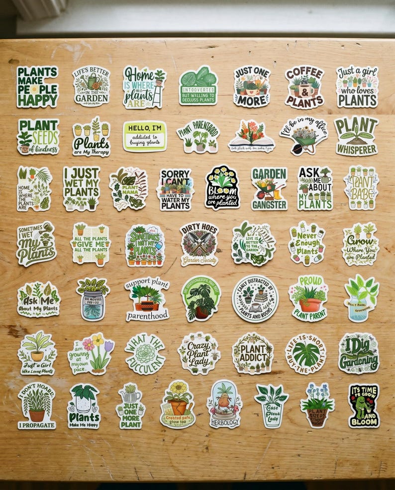May include: A collection of fifty-six die-cut vinyl stickers featuring various plant-themed illustrations and typography. The designs include potted plants, gardening tools, and humorous phrases like Plants Make People Happy, Plant Whisperer, and Dirty Hoes.