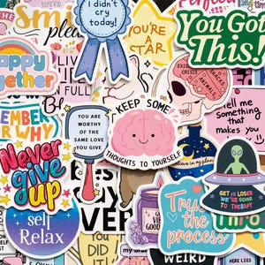 Könnte beinhalten: Eine Sammlung bunter Vinyl-Aufkleber mit verschiedenen Illustrationen und motivierenden Texten, darunter Phrasen wie You Got This, Keep Some Thoughts To Yourself, Never Give Up, I Didn't Cry Today und Get In Loser We're Going To Therapy.
