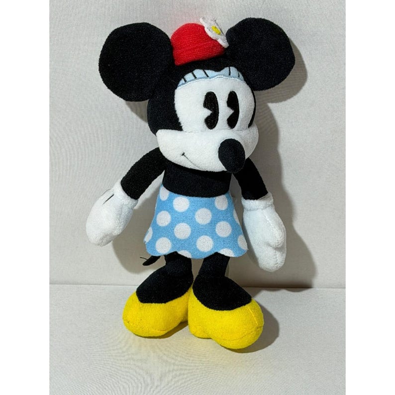 Peluche di Minnie Mouse Disney, gonna a pois blu e cappello rosso con margherite, 20 cm circa. immagine 11